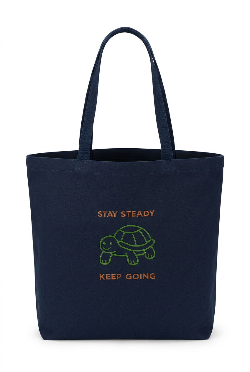 Stay Steady Canvas Tote with embroidered turtle design